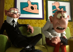 Mortadelo y Filemón sentados en un sofá